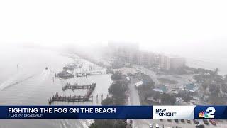 Fort Myers Beach businesses grounded by fog, tourists keep celebrating