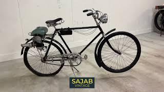 Pedal bike with outboard motor, Wico "Power Pak", mid 20th century