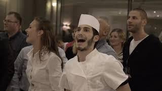 Flash Mob - Singing "We Will Rock You" in a hotel 