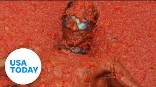 Thousands throw tomatoes at each other in La Tomatina festival | USA TODAY