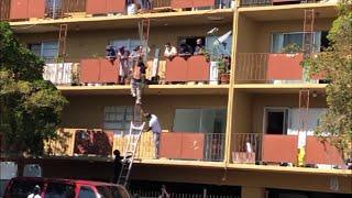 Fire at apartment complex in North Miami has people jumping to safety