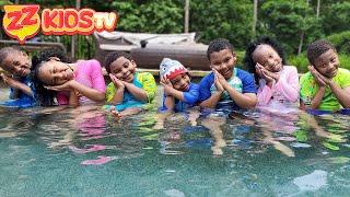 ZZ Kids TV Jumping Through Impossible Shapes Into Swimming Pool!