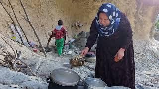 **Pure moments in the heart of the mountains: building a fire place and family feast**