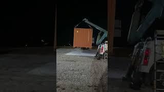 Two Heavy wreckers lifting a container  trailer swap