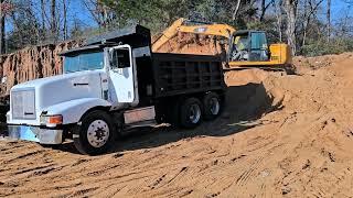 Mississippi Logging: Logger Doing Dump Truck Work On Christmas Eve