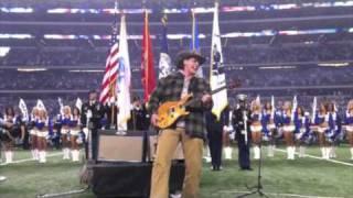 Ted playing national anthem at the Dallas Cowboys game.