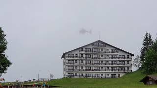 Helicopter flying in fog.