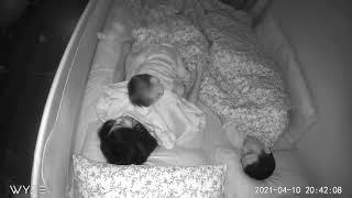 Baby monitor capture: Baby playing with mom before going to bed