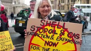 Climate protesters disrupt Shell shareholder meeting