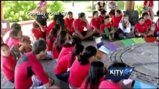 Hokule'a crewmembers take part in Global Education Village lesson in Tahiti