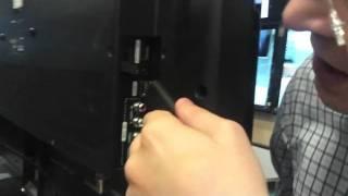 Plug HDMI Dongle on back of TV at Best Buy