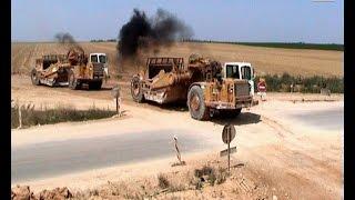 LGV Est Lot 12: CAT D10N & 631E, Entr. GTM, Deschiron, Etrépilly, France, 2004.