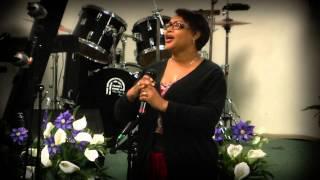 Elder Jones performs "The Cross Said It All"