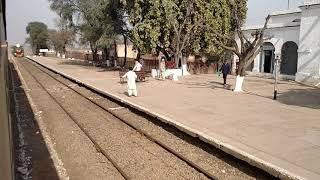 Railway Pakistan: Cross between 18 Down and 17 Up Millat Express at Charnali Railway Station