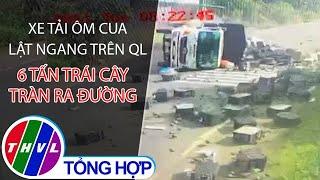 Xe tải ôm cua lật ngang trên quốc lộ, 6 tấn trái cây tràn ra đường