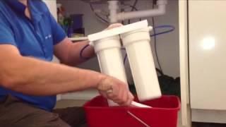 How to change water filter cartridges under sink