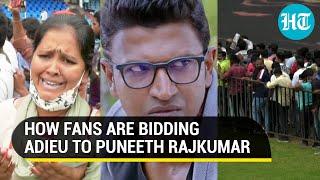 Crying fans, huge crowds, posters across cities as Kannada star Puneeth Rajkumar gets teary farewell