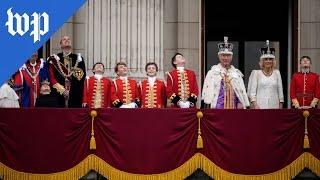 A royal wave from the balcony of Buckingham Palace