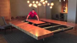 Modern cherry veneer dining table with giant leaf extensions and glides