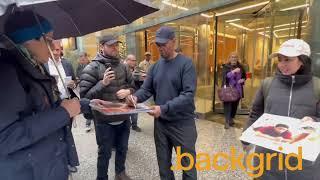 Denzel Washington signs autographs for fans in New York, NY