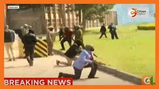 Standoff between protesters and police outside Parliament Buildings