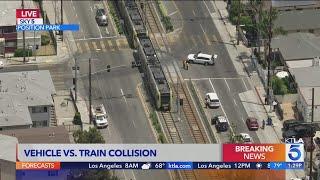 Train, vehicle collide in Expo Park