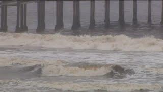 Why does the water look dirty, brown in Pacific Beach?