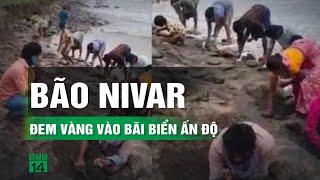 Người dân Ấn Độ đổ xô đi nhặt vàng, trang sức trôi dạt vào bãi biển sau bão | VTC14