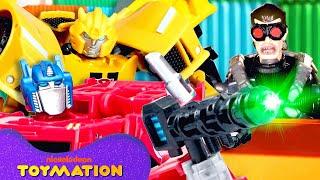 Bumblebee, Twitch, and More Transformers Bots Race Through Toy City! | Toymation