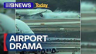 Wheels of Etihad airplane explode during take-off at Melbourne Airport | 9 News Australia