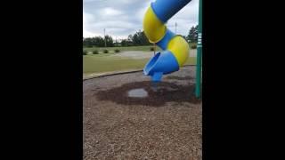 Fat man stuck in slide