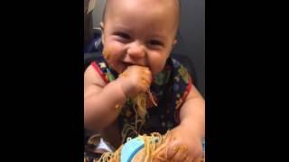 Emilio eating pasta