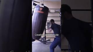 When fighting in close you can use the heavy bag to create space on the inside. #shorts #sports