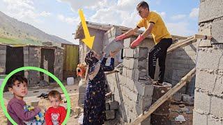 Building the future: Ali and Sakineh. Start building a new house in the mountain, 