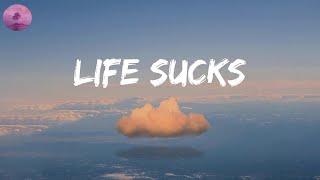 Life Sucks  - happy vibe songs that give you more energy