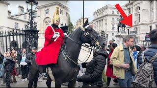 POOR HORSE!!  THIS HAPPENS at Horse Guards London Today!! Horse doesn't Like it, keeps tapping.