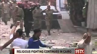 Hundreds of Christians and Muslims clash in Cairo