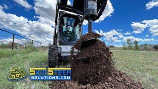 Drilling holes with the CID Heavy Duty Auger | Skid Steer Solutions