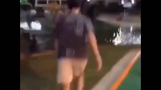 Guy jumps in put-put pond (idk)