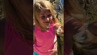 8 year old daughter catches a largemouth bass. It’s so cute!  #fishing #kidsfishing #largemouthbass