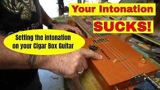 Cigar Box Guitar - What to DO, if Your Intonation SUCKS. Setting intonation on cigar box guitar.