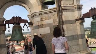 Ringing bells at the top of the leaning tower of Pisa