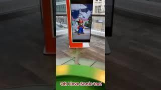 Guy asks Mario if he likes Sonic.