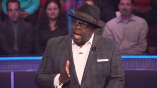 Cedric introduces Millionaire contestant Jon Arnon to the show