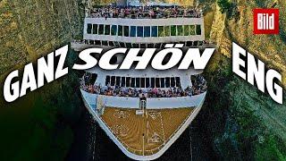 Kreuzfahrtschiff quetscht sich durch Kanal