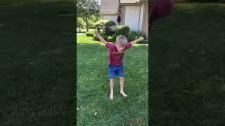 Little kid does a crazy backflip!