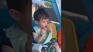 Baby enjoying watermelon on the beach #adorablebaby #adorableboy #bearlake #cutebaby #beachbaby