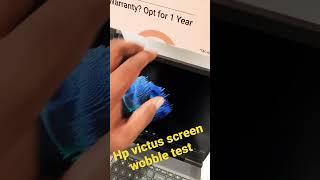 HP Victus screen wobble test‍