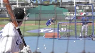 Big Slick takes a few "real" pitches at batting practice