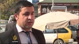 11681 governance economics Al Jazeera Anger over phone card tax in Afghanistan